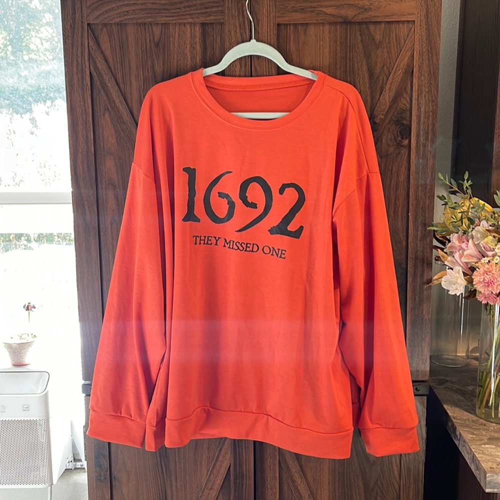 1692 “they missed one” long sleeve burnt orange sweater
